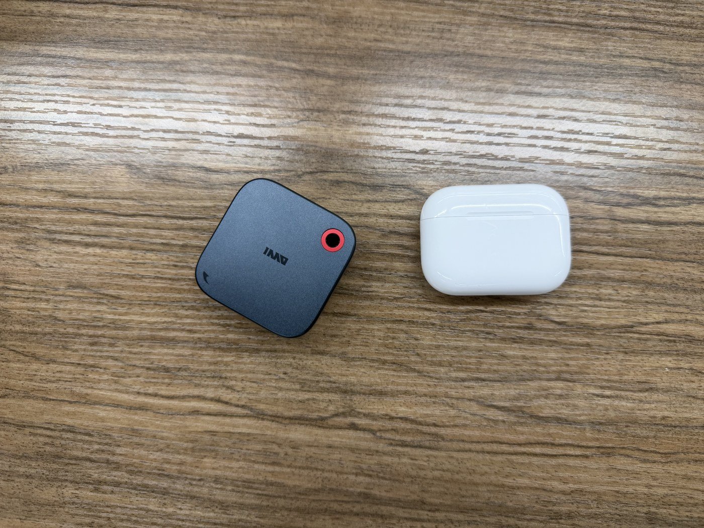 GO3 charging case on the left, AirPods Pro case on the right